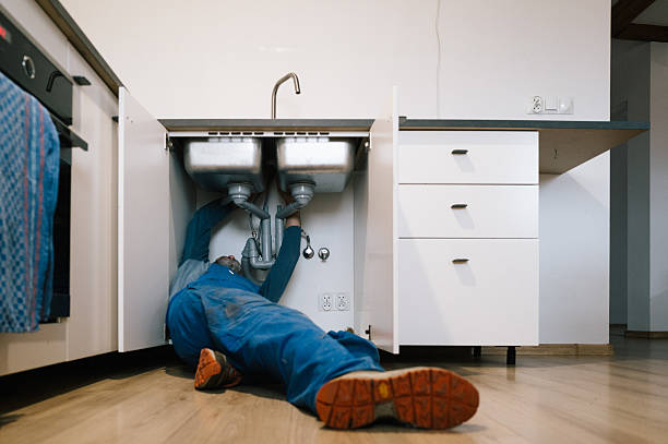 Professional Emergency Plumber technician working in Garrett, IN